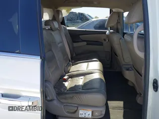 2014 Honda Odyssey Touring with VIN 5FNRL5H97EB037361, listed as a IAAI auction lot 42106742 with 198,279 mi miles and . Bid and sale history available at DreamBid. Image 8.