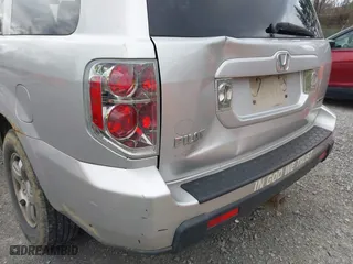 2006 Honda Pilot EX-L with RES with VIN 2HKYF18606H502115, listed as a IAAI auction lot 41872434 with 286,953 mi miles. Bid and sale history available at carsss.com. Image 13.