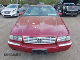1997 Cadillac Eldorado Touring ETC z VIN 1G6ET1297VU600449, wystawiony jako IAAI lot #42096992 z przebiegiem 185 918 mil mil oraz . Historia ofert i sprzedaży dostępna na DreamBid. Obrazek 6.