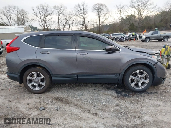 2019 Honda CR-V EX with VIN 7FARW1H57KE037678, listed as a IAAI auction lot 41790923 with 61,754 mi miles and . Bid and sale history available at DreamBid. Image 13.