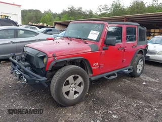 2007 Jeep Wrangler Unlimited X with VIN 1J4GB39197L150245, listed as a IAAI auction lot 41920390 with 239,532 mi miles and . Bid and sale history available at DreamBid. Image 17.