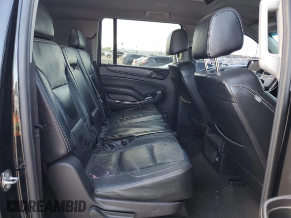 2017 Chevrolet Suburban LS with VIN 1GNSCGECXHR351539, listed as a Copart auction lot 87070214 with 246,129 mi miles and Salvage title. Bid and sale history available at DreamBid. Image 11.