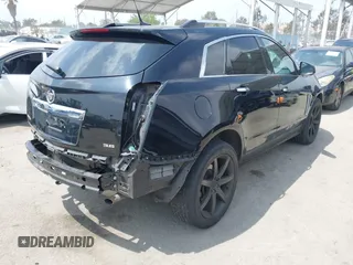 2014 Cadillac SRX Luxury Collection with VIN 3GYFNBE34ES639647, listed as a IAAI auction lot 42108140 with 99,740 mi miles and . Bid and sale history available at DreamBid. Image 4.