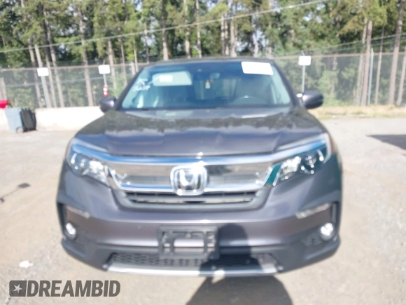 2019 Honda Pilot EX-L with VIN 5FNYF6H52KB035504, listed as a IAAI auction lot 42642735 with 54,736 mi miles and . Bid and sale history available at DreamBid. Image 12.