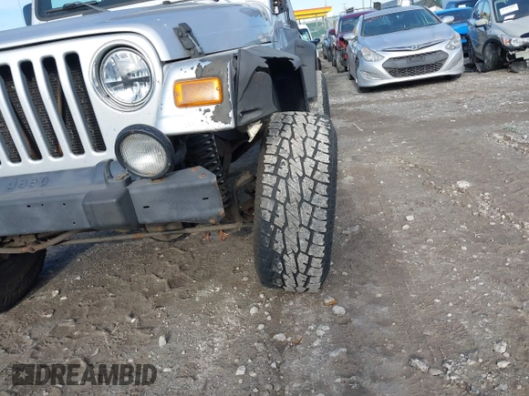 2003 Jeep Wrangler X with VIN 1J4FA39S33P363153, listed as a IAAI auction lot 41584805 with 160,676 mi miles. Bid and sale history available at carsss.com. Image 18.