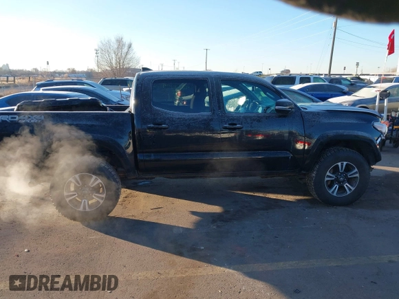 2016 Toyota Tacoma SR with VIN 3TMCZ5AN0GM023263, listed as a IAAI auction lot 41302069 with 137,276 mi miles and . Bid and sale history available at DreamBid. Image 14.