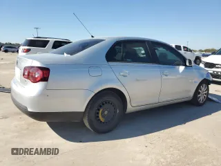 2009 Volkswagen Jetta S z VIN 3VWJM71K79M167562, wystawiony jako Copart lot #80546594 z przebiegiem 196 891 mil mil oraz Szkoda całkowita • Salvage title. Historia ofert i sprzedaży dostępna na DreamBid. Obrazek 3.