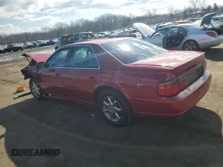 2000 Cadillac Seville Touring STS z VIN 1G6KY5496YU340882, wystawiony jako Copart lot #46866585 z przebiegiem Nie podano mil oraz Szkoda całkowita • Salvage title. Historia ofert i sprzedaży dostępna na DreamBid. Obrazek 2.