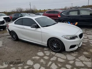2015 BMW 2 Series M235i with VIN WBA1J7C59FV358868, listed as a Copart auction lot 80905154 with 88,561 mi miles and Salvage Title. Bid and sale history available at carsss.com. Image 4.