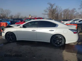 2013 Nissan Maxima SV with VIN 1N4AA5AP4DC821476, listed as a IAAI auction lot 41782887 with 140,956 mi miles and . Bid and sale history available at DreamBid. Image 14.
