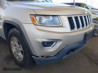 2014 Jeep Grand Cherokee Laredo with VIN 1C4RJFAG7EC380544, listed as a IAAI auction lot 42021130 with 166,589 mi miles. Bid and sale history available at carsss.com. Image 6.