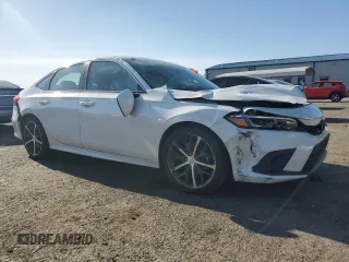 2024 Honda Civic Touring z VIN 2HGFE1F94RH313375, wystawiony jako Copart lot #54844905 z przebiegiem Nie podano mil oraz Szkoda całkowita • Salvage title. Historia ofert i sprzedaży dostępna na DreamBid. Obrazek 4.