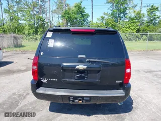 2011 Chevrolet Suburban LTZ with VIN 1GNSCKE01BR275919, listed as a IAAI auction lot 42038399 with 247,841 mi miles. Bid and sale history available at carsss.com. Image 16.