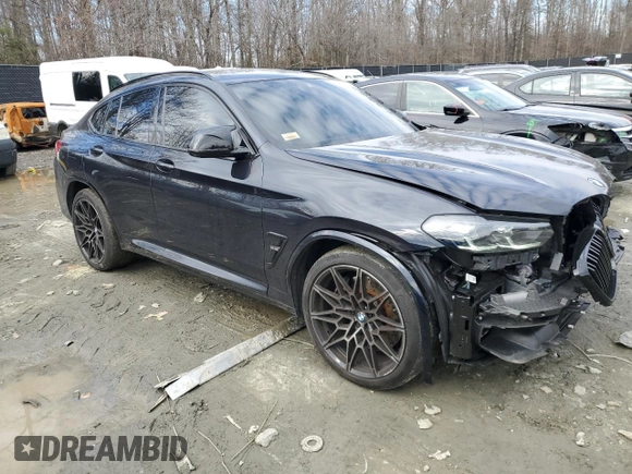 2023 BMW X4 M with VIN 5YM23EC03P9S24918, listed as a Copart auction lot 45127705 with 9,817 mi miles and Salvage Title. Bid and sale history available at carsss.com. Image 4.