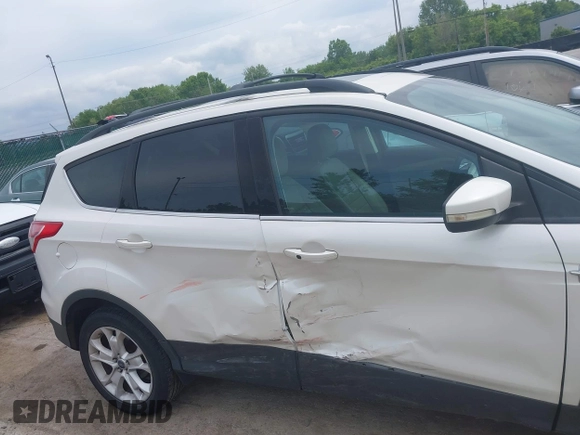 2013 Ford Escape SEL with VIN 1FMCU9H90DUC52981, listed as a IAAI auction lot 42506500 with 74,212 mi miles and . Bid and sale history available at DreamBid. Image 13.