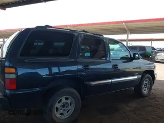 2004 GMC Yukon SLT with VIN 1GKEC13V94J125366, listed as a IAAI auction lot 42089017 with 287,827 mi miles. Bid and sale history available at carsss.com. Image 13.