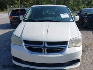 2013 Dodge Grand Caravan SXT with VIN 2C4RDGCG3DR537051, listed as a IAAI auction lot 41919188 with 180,524 mi miles. Bid and sale history available at carsss.com. Image 6.