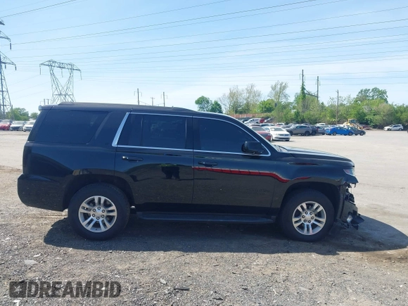 2020 Chevrolet Tahoe LT with VIN 1GNSKBKCXLR255963, listed as a IAAI auction lot 42127845 with 46,746 mi miles and . Bid and sale history available at DreamBid. Image 13.