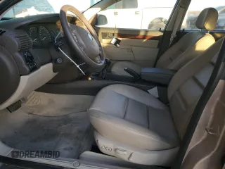 2000 Cadillac Catera z VIN W06VR54R5YR010954, wystawiony jako Copart lot #84863204 z przebiegiem 47 864 mil mil oraz Tytuł czysty. Historia ofert i sprzedaży dostępna na DreamBid. Obrazek 7.
