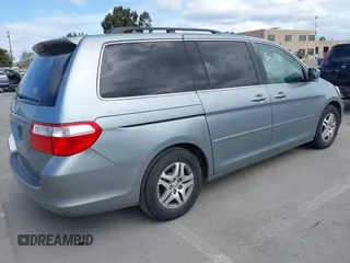 2007 Honda Odyssey EX-L with VIN 5FNRL38727B017587, listed as a IAAI auction lot 41900739 with 216,909 mi miles and . Bid and sale history available at carsss.com. Image 4.