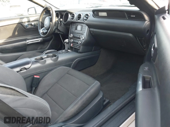 2016 Ford Mustang V6 z VIN 1FATP8EMXG5243434, wystawiony jako IAAI lot #41484039 z przebiegiem 131 032 mil mil oraz . Historia ofert i sprzedaży dostępna na DreamBid. Obrazek 5.