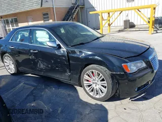 2012 Chrysler 300 C Luxury Series with VIN 2C3CCAPT4CH289639, listed as a IAAI auction lot 40634352 with 118,958 mi miles and . Bid and sale history available at carsss.com. Image 1.