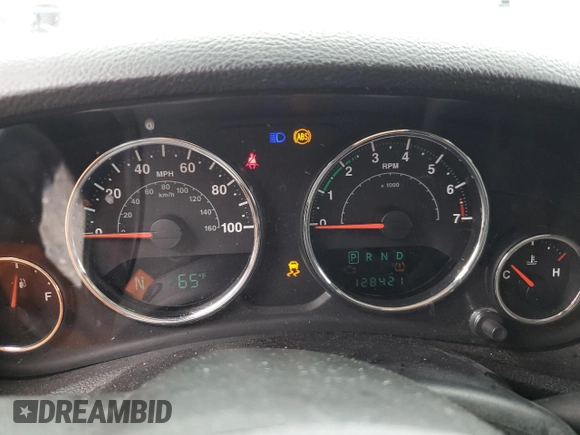 2012 Jeep Wrangler Unlimited Sport z VIN 1C4BJWDG9CL102626, wystawiony jako Copart lot #58421455 z przebiegiem 128 421 mil mil oraz Szkoda całkowita • Salvage title. Historia ofert i sprzedaży dostępna na DreamBid. Obrazek 9.