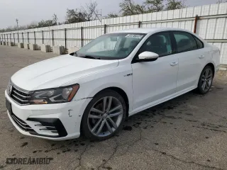 2018 Volkswagen Passat 2.0T S with VIN 1VWAA7A38JC030833, listed as a Copart auction lot 45661595 with 126,729 mi miles and Clean Title. Bid and sale history available at carsss.com. Image 1.