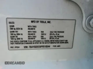 2023 Tesla Model Y Long Range z VIN 7SAYGDEE8PF816544, wystawiony jako Copart lot #57170485 z przebiegiem 74 598 mil mil oraz Szkoda całkowita • Salvage title. Historia ofert i sprzedaży dostępna na DreamBid. Obrazek 12.