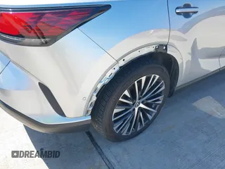 2024 Lexus RX with VIN 2T2BAMBA5RC029138, listed as a IAAI auction lot 41709254 with 22,576 mi miles. Bid and sale history available at carsss.com. Image 17.