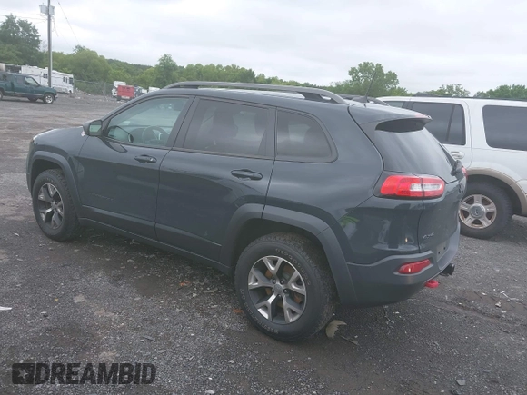 2017 Jeep Cherokee Trailhawk z VIN 1C4PJMBS2HW532974, wystawiony jako IAAI lot #42523785 z przebiegiem 74 272 mil mil oraz . Historia ofert i sprzedaży dostępna na DreamBid. Obrazek 3.