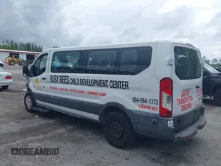 2018 Ford Transit Passenger XL with VIN 1FBZX2ZM0JKA10221, listed as a IAAI auction lot 41988879 with 54,340 mi miles and . Bid and sale history available at DreamBid. Image 3.