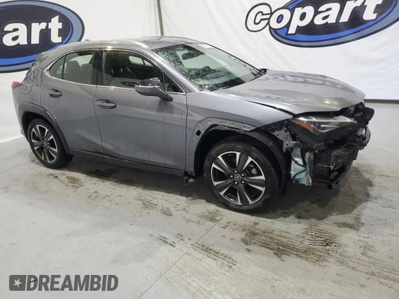2020 Lexus UX with VIN JTHX3JBHXL2028345, listed as a Copart auction lot 77428604 with 67,892 mi miles and Clean Title. Bid and sale history available at carsss.com. Image 4.