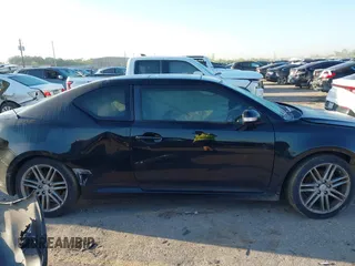 2013 Scion tC with VIN JTKJF5C77D3050609, listed as a IAAI auction lot 41872911 with 197,531 mi miles. Bid and sale history available at carsss.com. Image 14.