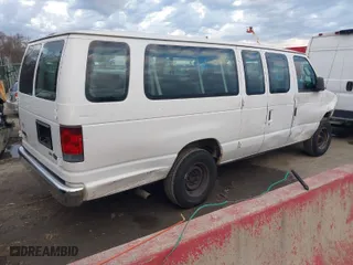 2010 Ford Econoline Wagon XL with VIN 1FBSS3BL6ADA81371, listed as a IAAI auction lot 41192772 with 154,886 mi miles. Bid and sale history available at carsss.com. Image 4.