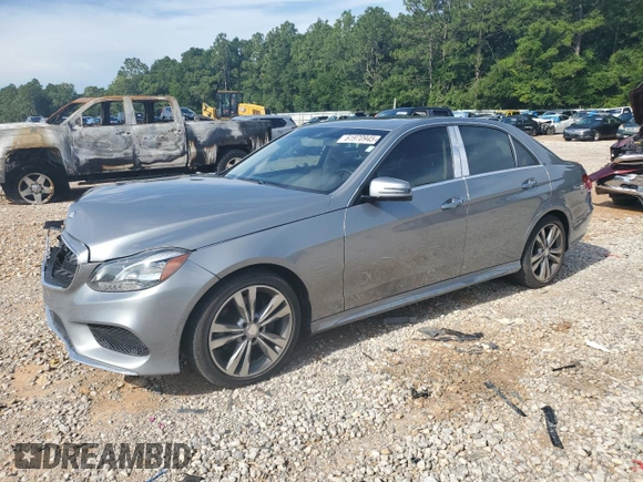 2014 Mercedes-Benz E 350 Sport with VIN WDDHF5KB5EB047443, listed as a Copart auction lot 61970945 with 119,998 mi miles and Salvage title. Bid and sale history available at DreamBid. Image 1.