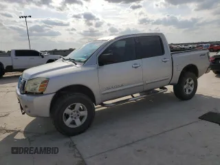2006 Nissan Titan SE z VIN 1N6BA07B96N575977, wystawiony jako Copart lot #50897375 z przebiegiem 203 013 mil mil oraz Czysty tytuł • Clean title. Historia ofert i sprzedaży dostępna na DreamBid. Obrazek 1.