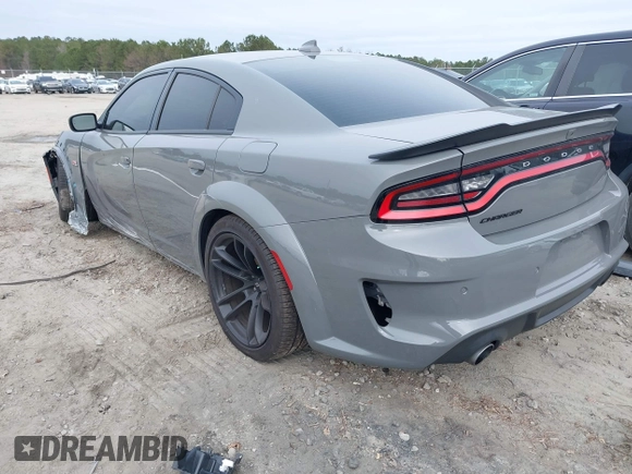 2023 Dodge Charger Scat Pack Widebody with VIN 2C3CDXGJ6PH646050, listed as a IAAI auction lot 41175513 with 7,684 mi miles and . Bid and sale history available at DreamBid. Image 3.