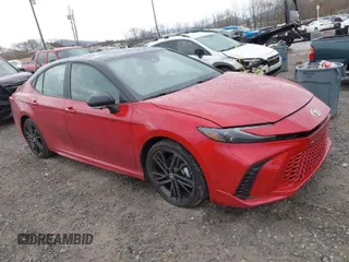 2025 Toyota Camry LE with VIN 4T1DAACK6SU052760, listed as a IAAI auction lot 41923980 with 5,586 mi miles and . Bid and sale history available at DreamBid. Image 1.