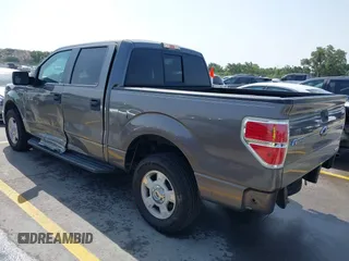 2014 Ford F-150 XL with VIN 1FTEW1CM9EFA19241, listed as a IAAI auction lot 42310150 with 139,041 mi miles and . Bid and sale history available at DreamBid. Image 3.