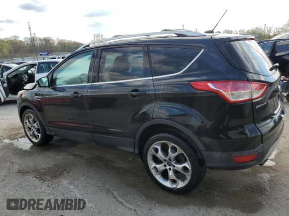 2013 Ford Escape Titanium z VIN 1FMCU0J96DUD76873, wystawiony jako Copart lot #52934235 z przebiegiem 141 834 mil mil oraz Szkody całkowita. Historia ofert i sprzedaży dostępna na DreamBid. Obrazek 2.