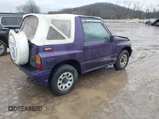 1993 Suzuki Sidekick z VIN 2S3TA01C4P6406238, wystawiony jako IAAI lot #41469419 z przebiegiem 126 667 mil mil oraz . Historia ofert i sprzedaży dostępna na DreamBid. Obrazek 4.