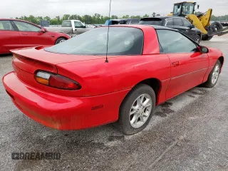 2002 Chevrolet Camaro z VIN 2G1FP22K322135404, wystawiony jako Copart lot #58767305 z przebiegiem Nie podano mil oraz Czysty tytuł • Clean title. Historia ofert i sprzedaży dostępna na DreamBid. Obrazek 3.