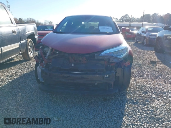 2020 Toyota C-HR LE with VIN JTNKHMBXXL1090061, listed as a IAAI auction lot 41124269 with 99,034 mi miles. Bid and sale history available at carsss.com. Image 13.