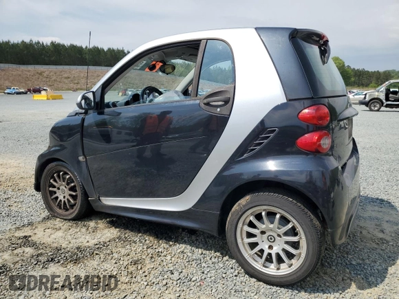 2013 Smart fortwo Pure with VIN WMEEJ3BA9DK670264, listed as a Copart auction lot 52817215 with 51,434 mi miles and Salvage Title. Bid and sale history available at DreamBid. Image 2.