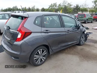 2018 Honda Fit EX with VIN 3HGGK5H85JM704873, listed as a IAAI auction lot 42421049 with 58,481 mi miles and . Bid and sale history available at DreamBid. Image 4.