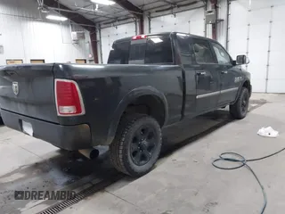 2015 Ram 2500 Laramie with VIN 3C6UR5NL9FG646401, listed as a IAAI auction lot 41104911 with 16,800 mi miles and . Bid and sale history available at DreamBid. Image 4.