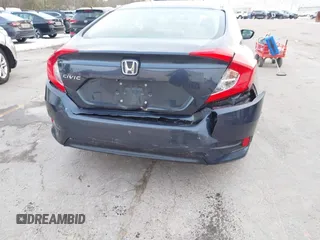 2017 Honda Civic LX z VIN 19XFC2F52HE028823, wystawiony jako IAAI lot #41312009 z przebiegiem 56 462 mil mil oraz . Historia ofert i sprzedaży dostępna na DreamBid. Obrazek 6.
