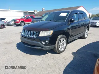 2013 Jeep Compass Sport with VIN 1C4NJDBB1DD217533, listed as a IAAI auction lot 41461759 with 205,972 mi miles. Bid and sale history available at carsss.com. Image 2.