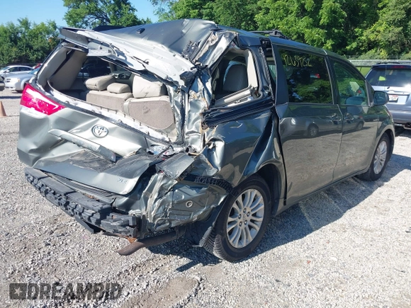 2011 Toyota Sienna XLE AAS with VIN 5TDYK3DC4BS136568, listed as a IAAI auction lot 42639252 with 239,020 mi miles and . Bid and sale history available at DreamBid. Image 4.